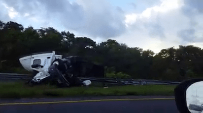 semi overturns on florida turnpike