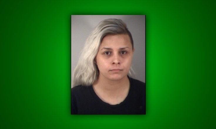 A Sorrento woman was arrested after being accused of "beating up" her husband during a dispute over child care issues with their toddler.