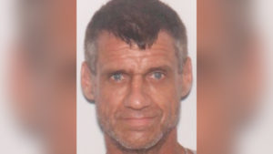 45-year-old Joey Edward Morgan is wanted for attempted murder after witnesses say he beat his wife along I-75 Thursday morning, pushing her into oncoming traffic.