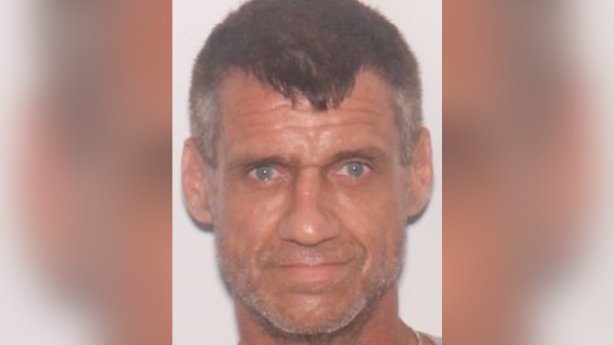 45-year-old Joey Edward Morgan is wanted for attempted murder after witnesses say he beat his wife along I-75 Thursday morning, pushing her into oncoming traffic.