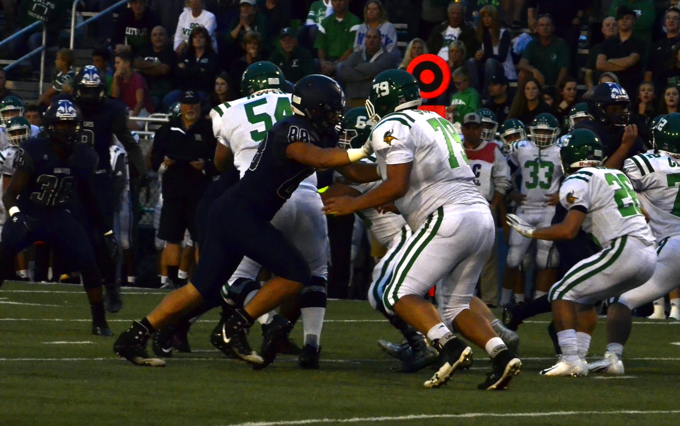 Justin Wozniak (88) taking on Valpo lineman Ben Scott (79) during the Wolves vs. Vikings game Friday night at Ames Field.